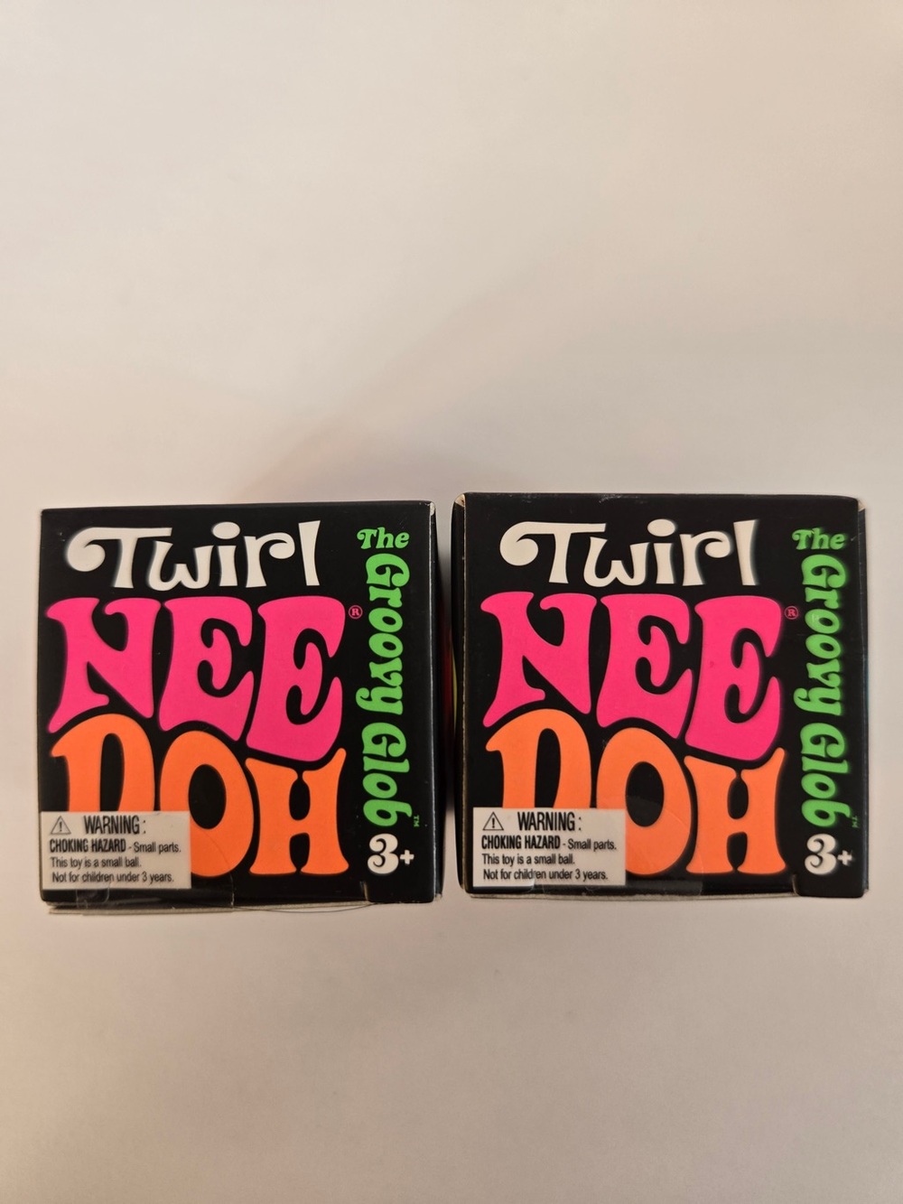 Nee Doh The Groovy Glob twirl  Pink & Orange mini